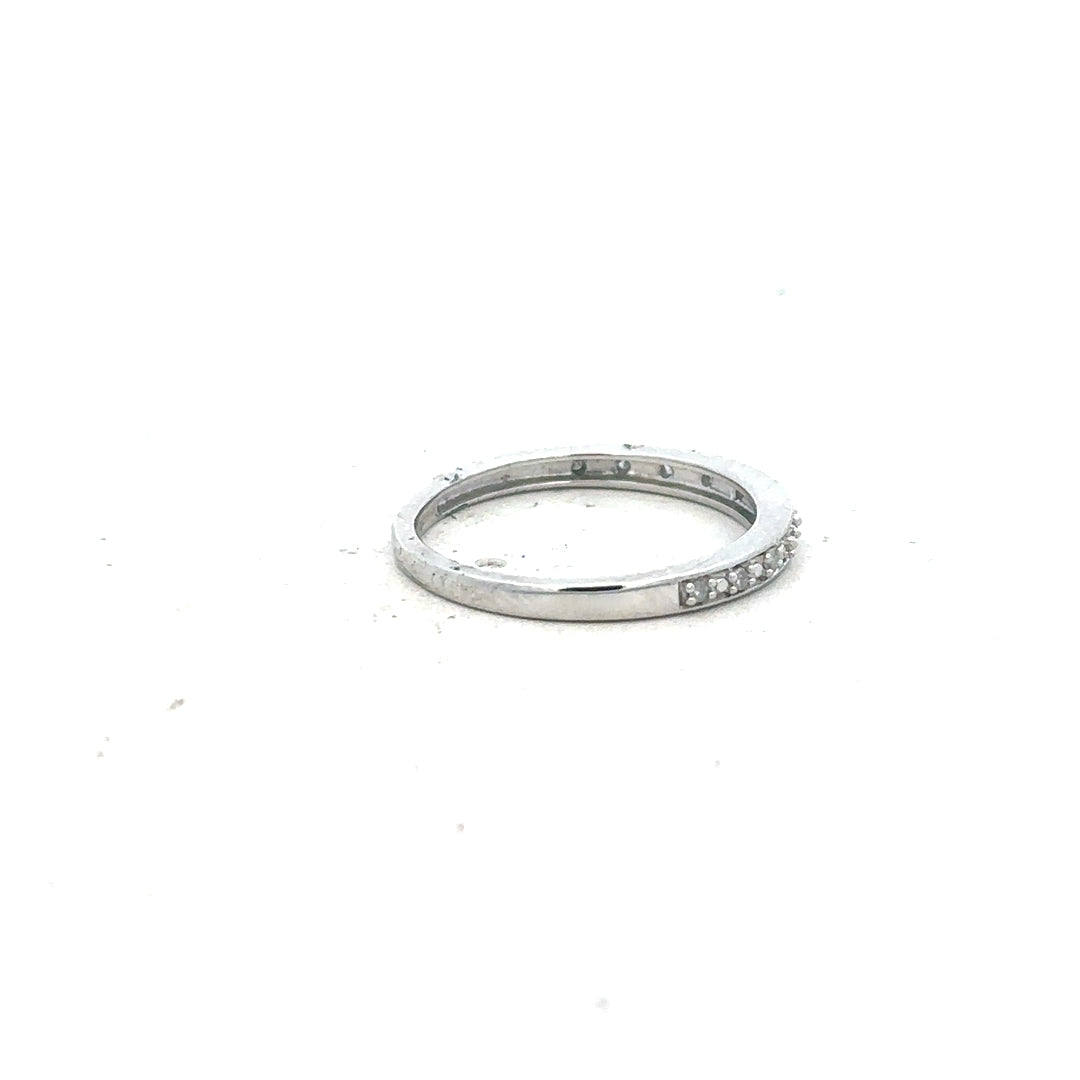 9ct white gold diamond ring in size J1/2, featuring a sparkling diamond setting, unbranded jewelry accessory.