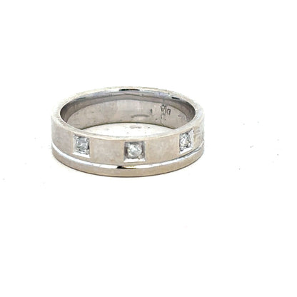 9ct white gold diamond ring size K 1/2 with sparkling diamonds, showcasing elegant craftsmanship and a sleek design.