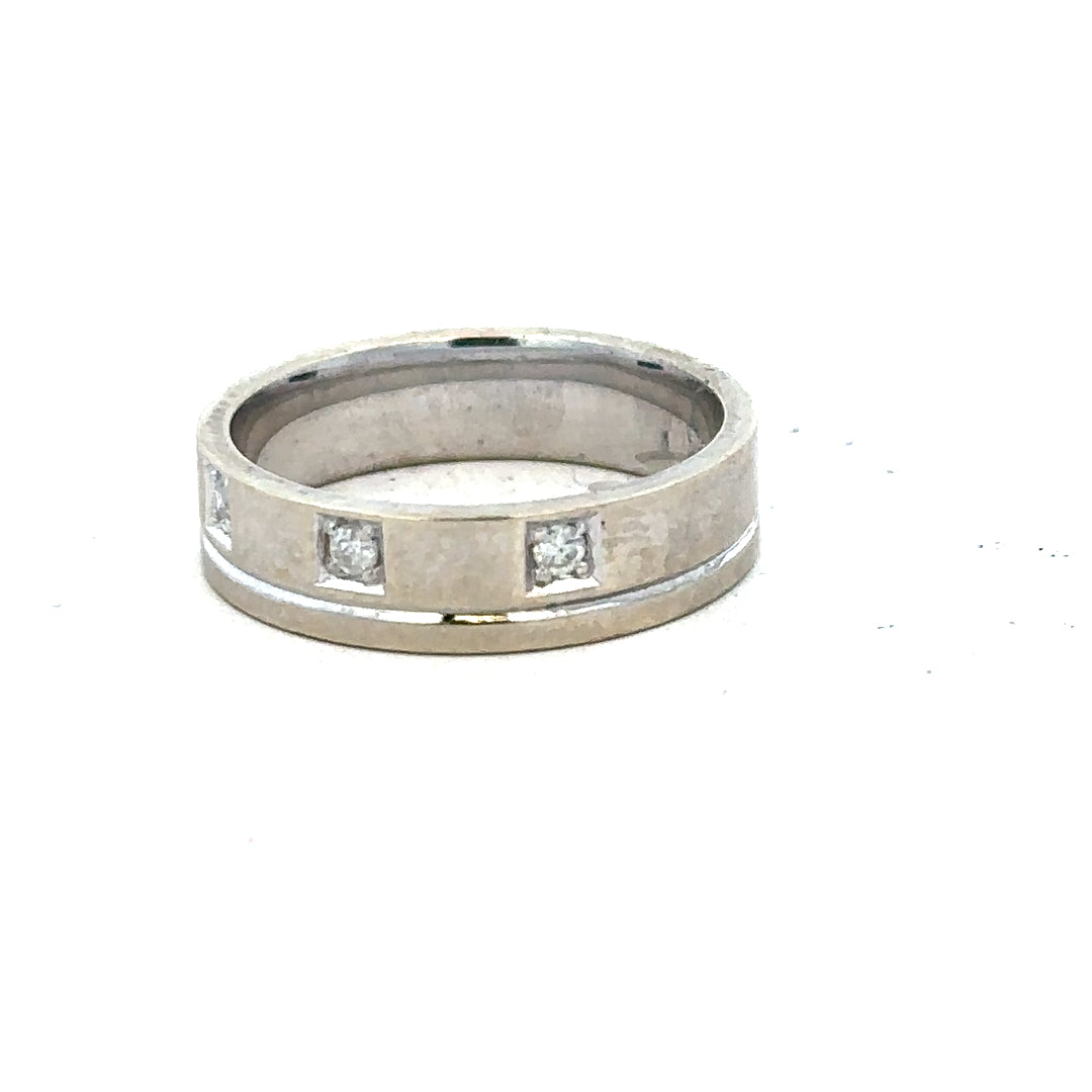9ct white gold diamond ring size K1/2 with sparkling diamonds, showcasing elegant jewelry design and craftsmanship.