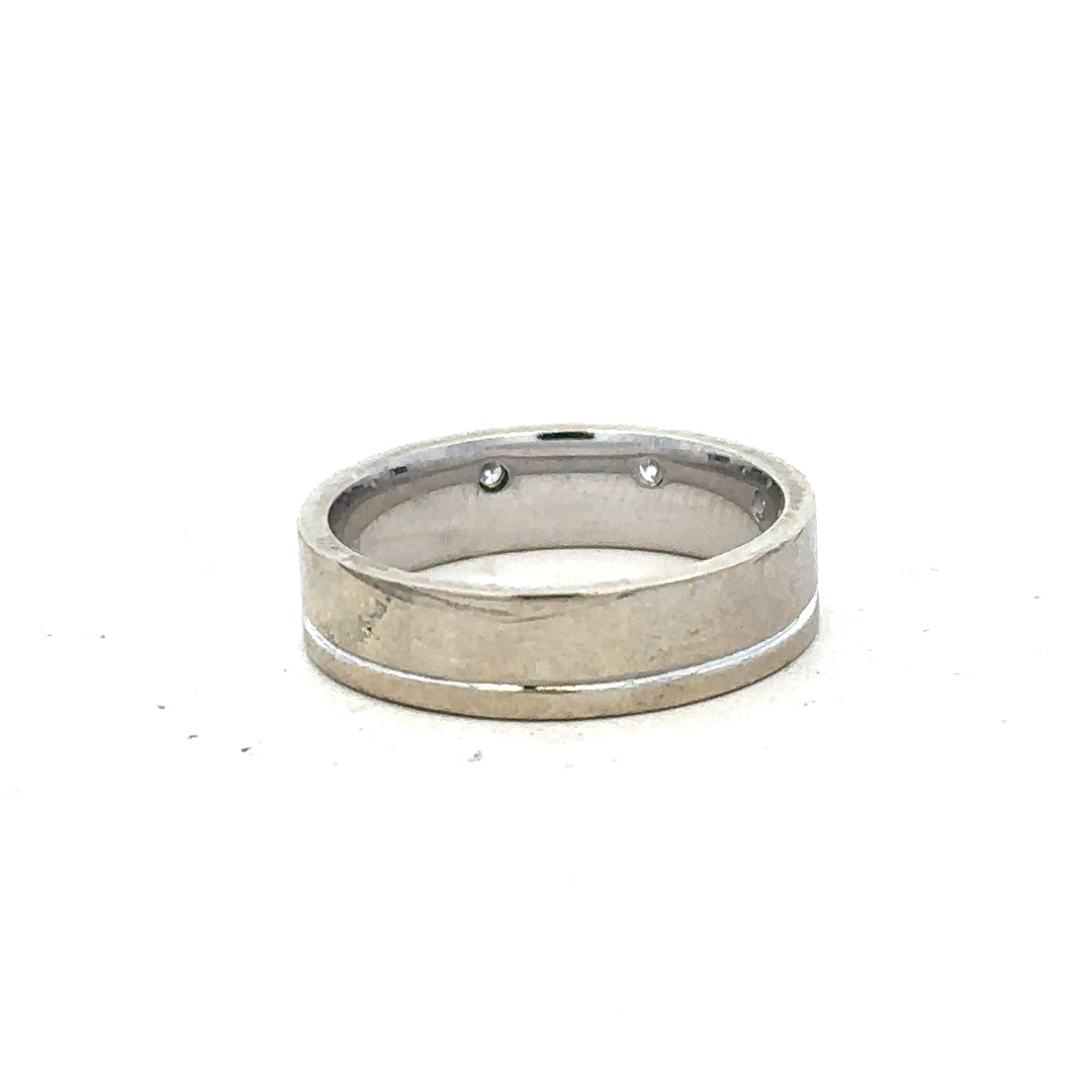 9ct white gold diamond ring size K1/2 with sparkling diamonds, showcasing elegant jewelry design and craftsmanship.