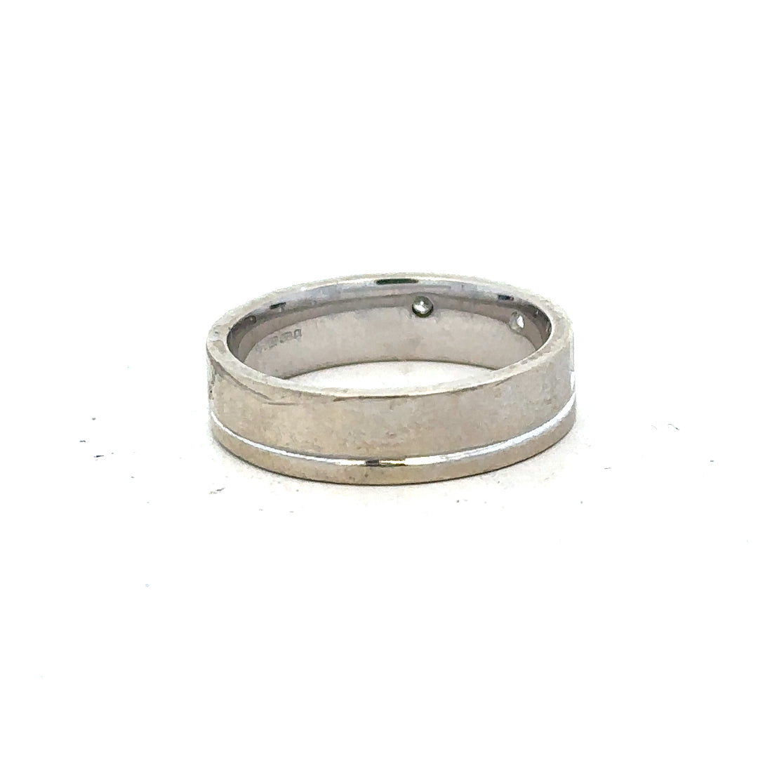 9ct white gold diamond ring size K1/2 with sparkling diamonds, showcasing a sleek and elegant design.