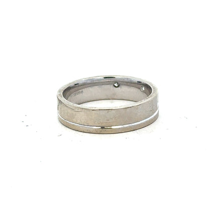 9ct white gold diamond ring size K1/2 with sparkling diamonds, showcasing a sleek and elegant design.