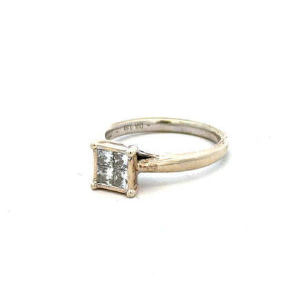 9ct white gold diamond ring in size L1/2, featuring sparkling diamonds and a sleek band design.