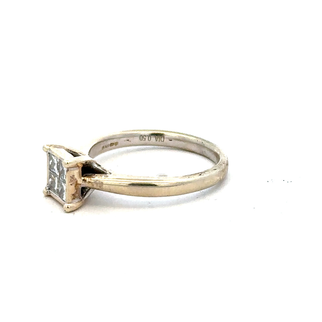 9ct white gold diamond ring in size L1/2 with a sparkling diamond, showcasing elegant craftsmanship and fine jewelry design.
