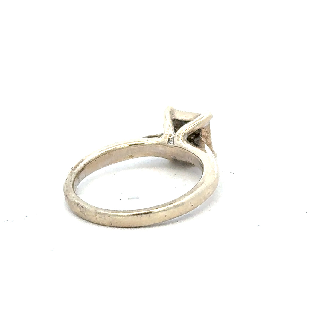 9ct white gold diamond ring size L1/2 with sparkling diamonds, featuring a sleek and elegant design.