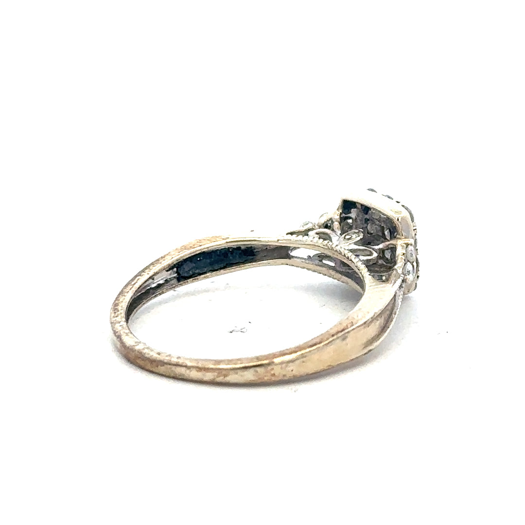 9ct white gold diamond ring in size N with 2.3g weight, featuring a sparkling diamond setting and a sleek band design.