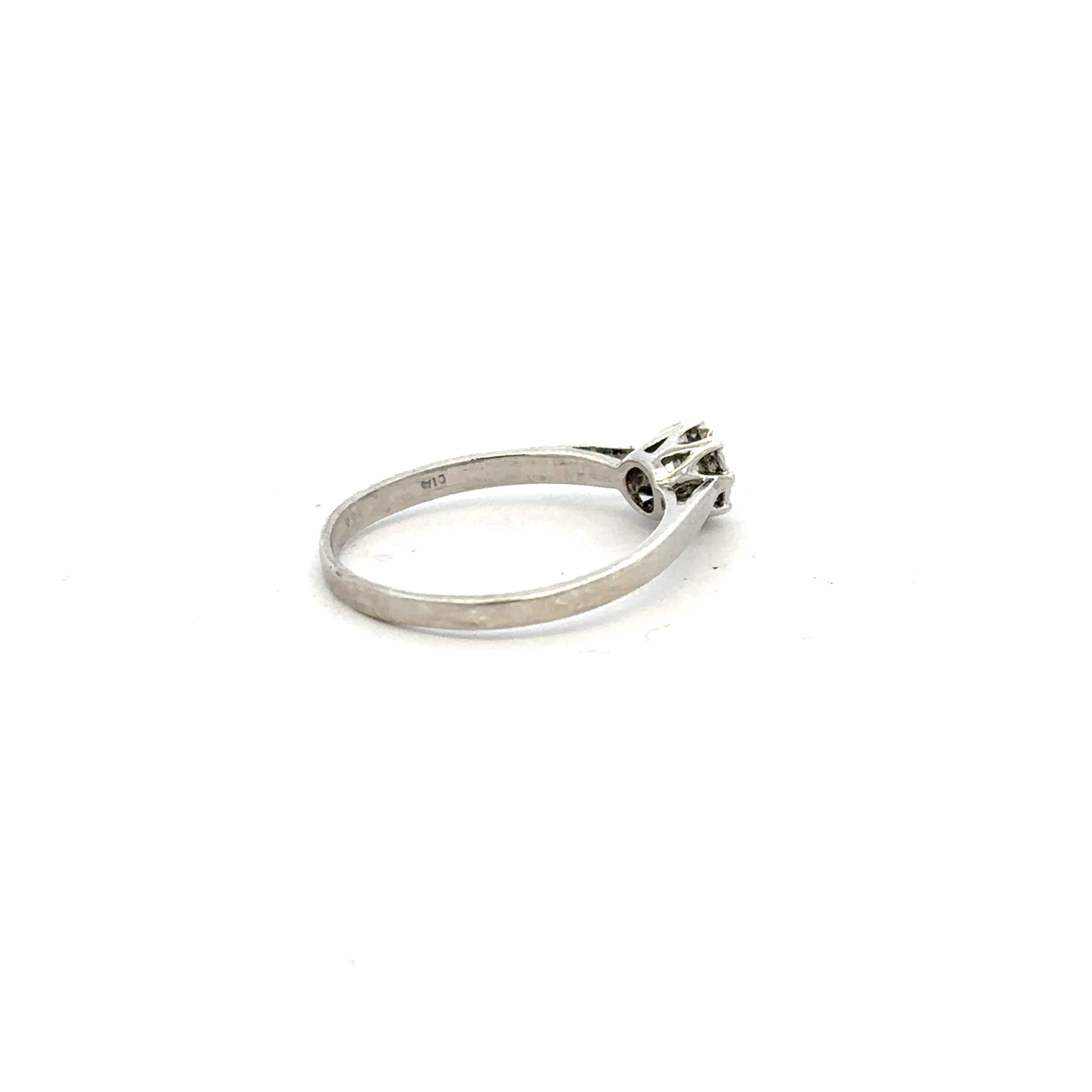 9ct white gold diamond ring size N with sparkling diamonds, showcasing a polished band and elegant design.