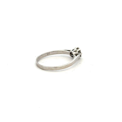 9ct white gold diamond ring size N with sparkling diamonds, showcasing a polished band and elegant design.