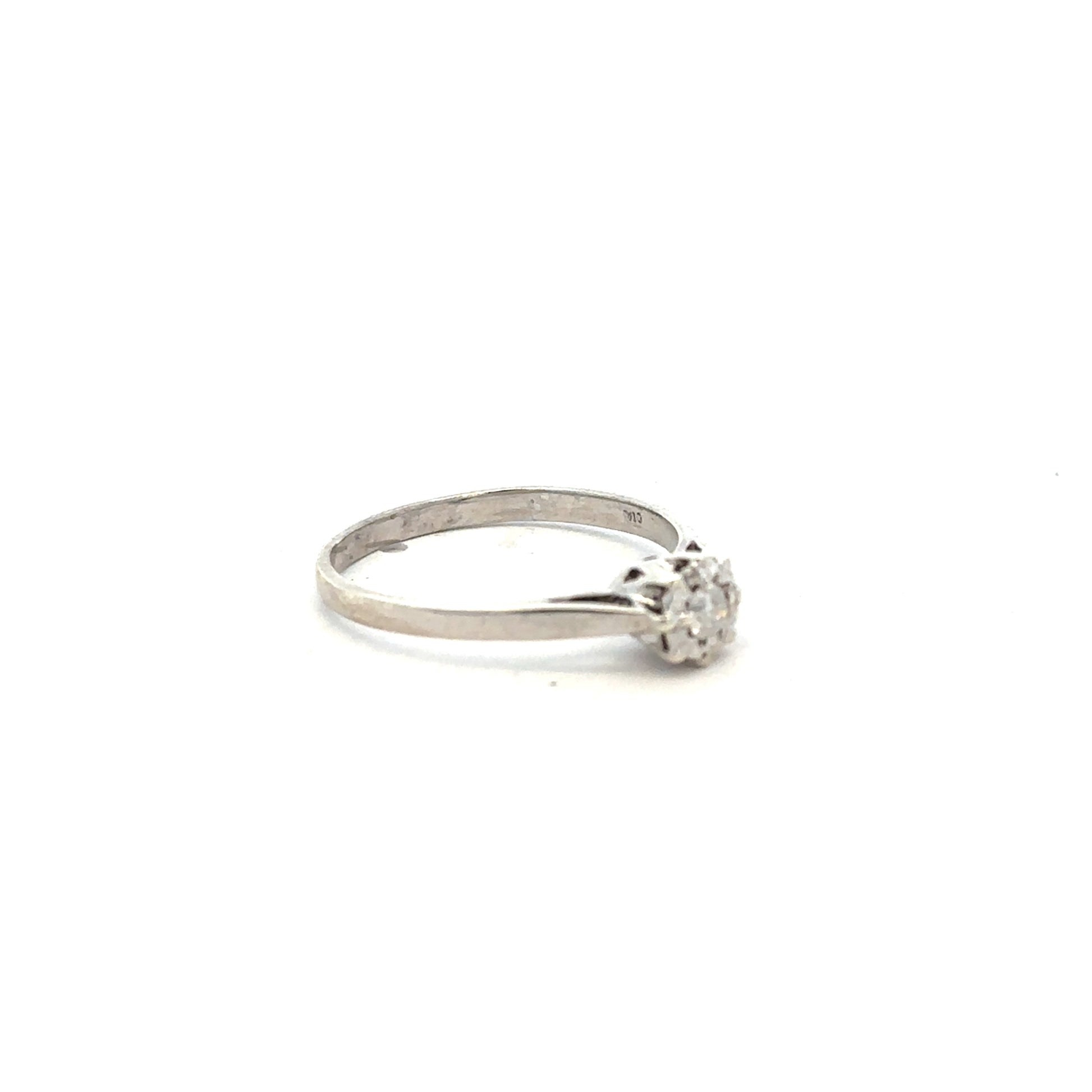 9ct white gold diamond ring size N with a sparkling diamond, showcasing elegant craftsmanship and a classic design.