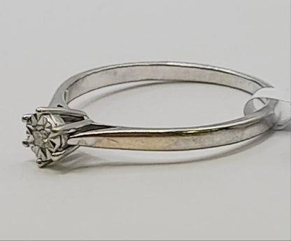 9ct white gold diamond ring in size N with sparkling diamonds, showcasing a classic and elegant design.