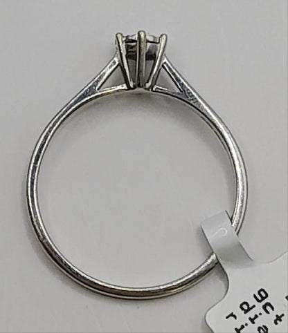 9ct white gold diamond ring in size N with sparkling diamonds, showcasing elegant jewelry design and craftsmanship.