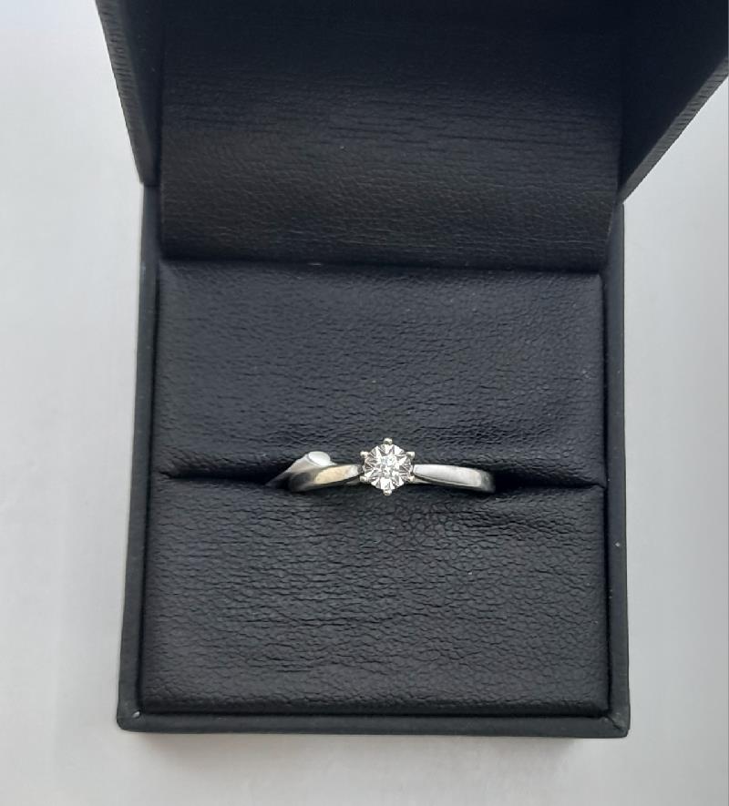 9ct white gold diamond ring in size N, showcasing a sparkling diamond setting on a sleek band.