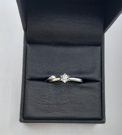 9ct white gold diamond ring in size N, showcasing a sparkling diamond setting on a sleek band.