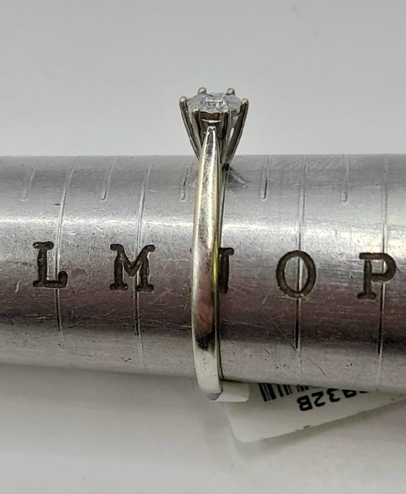9ct white gold diamond ring in size N with a sleek design, featuring sparkling diamonds on a classic band.