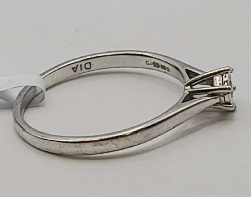 9ct white gold diamond ring in size N featuring sparkling diamonds, unbranded jewelry piece with elegant design.