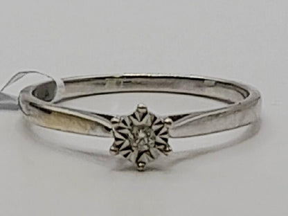 9ct white gold diamond ring in size N featuring a sparkling central diamond and intricate band design.