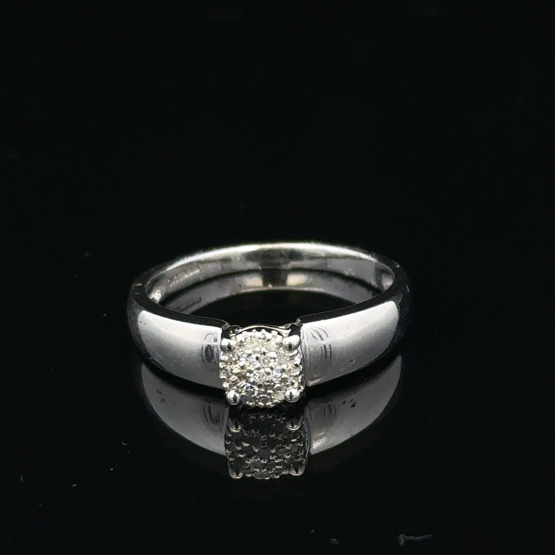 9ct white gold diamond ring in size N½, featuring a sparkling diamond centerpiece and a sleek, elegant band.