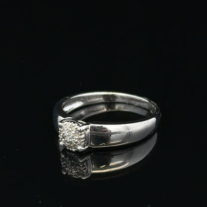9ct white gold diamond ring, size N1/2, with a sparkling diamond centerpiece and elegant band design.