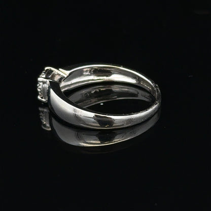 9ct white gold diamond ring in size N1/2, featuring a sparkling diamond set in a sleek band.