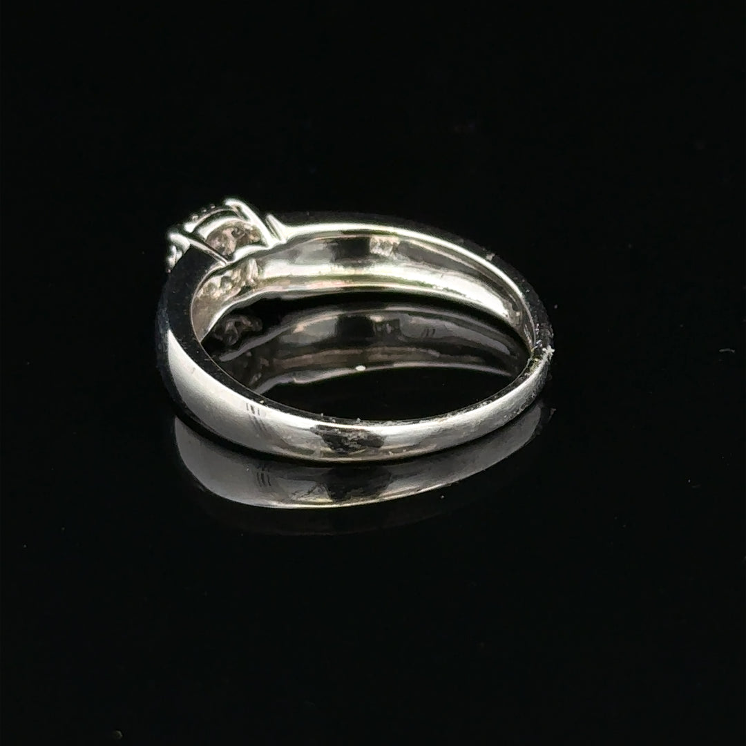 9ct white gold diamond ring in size N1/2, featuring a sparkling diamond design, unbranded jewelry piece.
