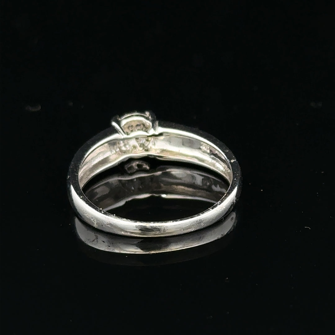 9ct white gold diamond ring in size N1/2 featuring a sparkling diamond setting and elegant design.