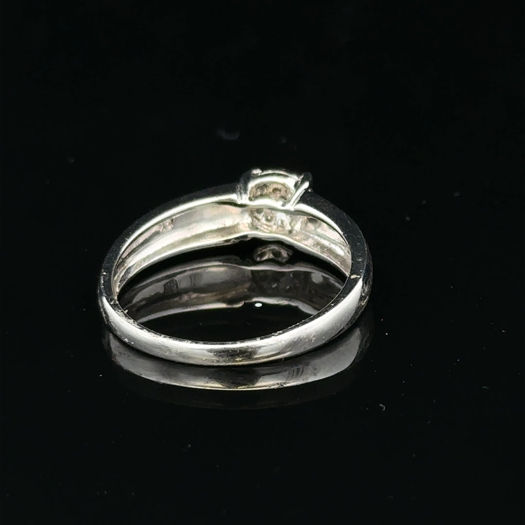 9ct white gold diamond ring in size N1/2 with sparkling diamonds, showcasing elegant jewelry craftsmanship.