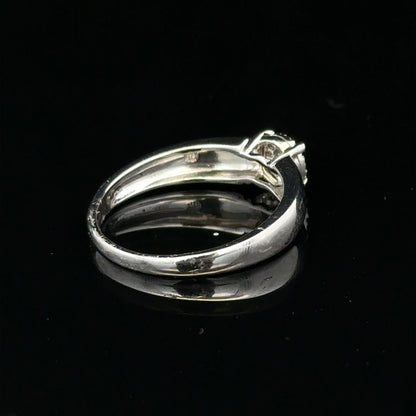 9ct white gold diamond ring in size N1/2, featuring a sparkling central diamond and elegant band design.