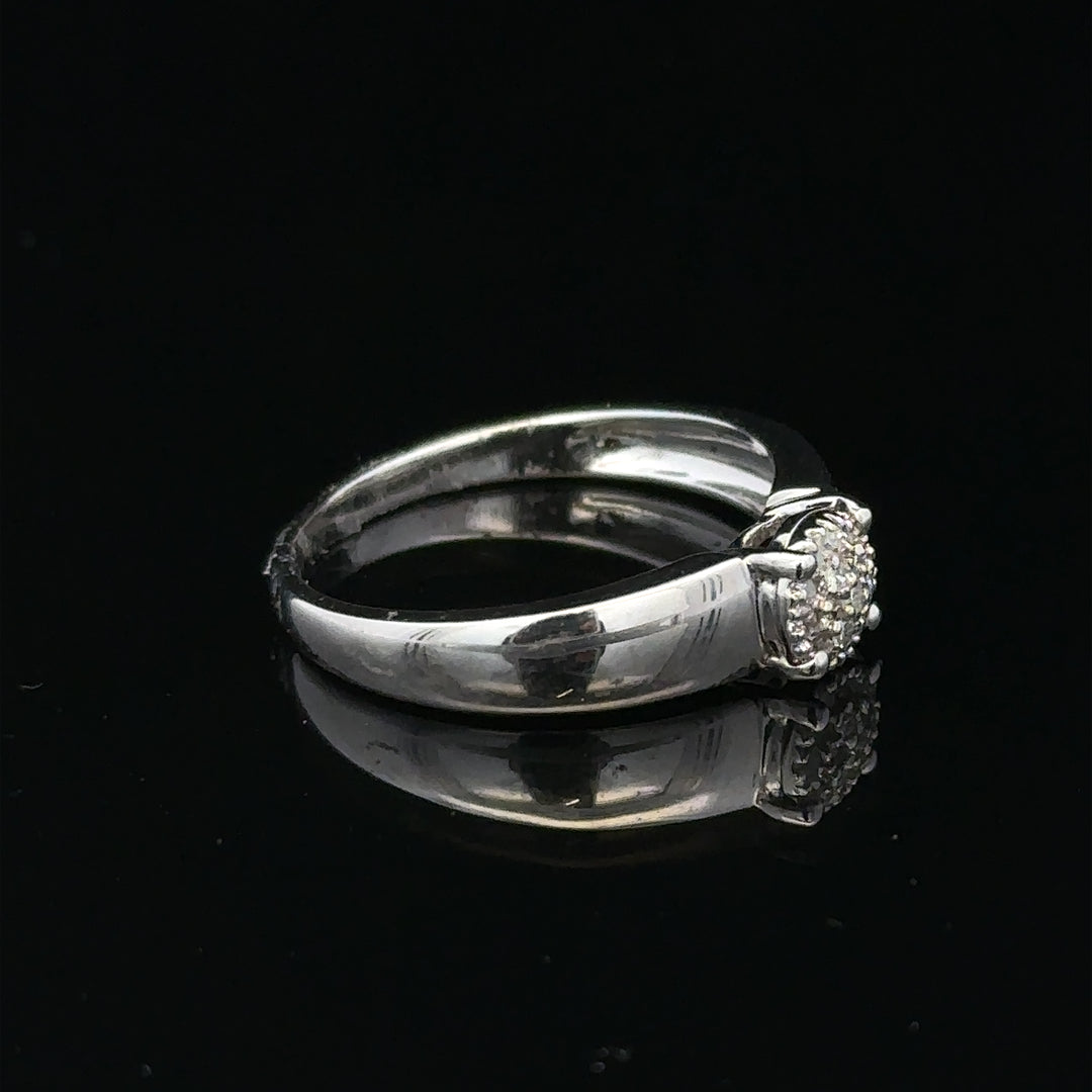 9ct white gold diamond ring in size N1/2, featuring a sparkling diamond setting, unbranded jewelry piece.