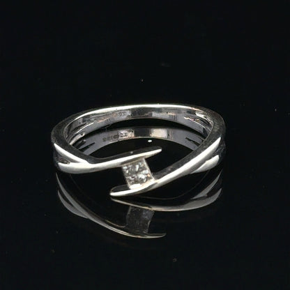 9ct white gold diamond ring in size O with sparkling diamonds, showcasing elegant craftsmanship and a sleek design.