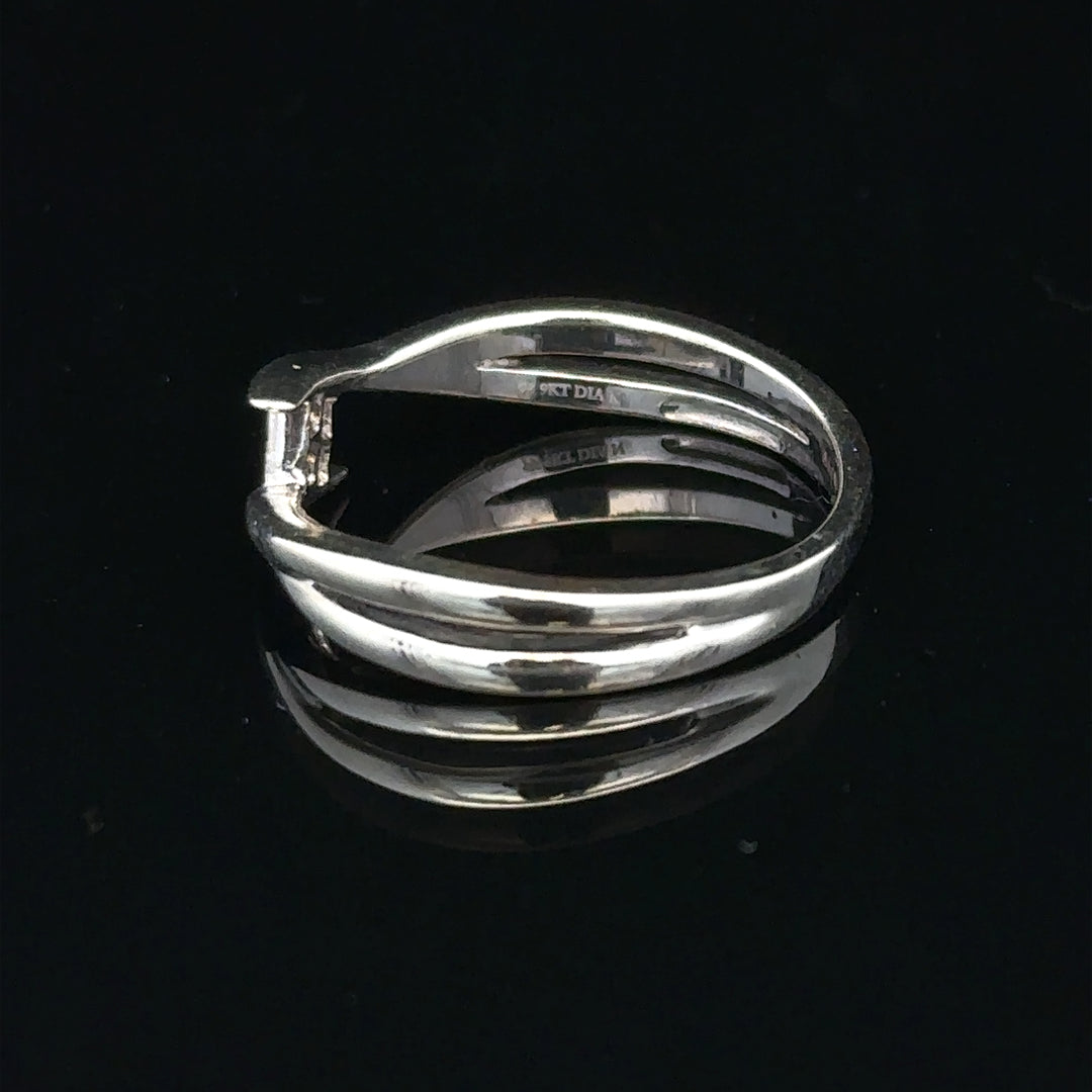 9ct white gold diamond ring in size O with a sparkling diamond, featuring a sleek and elegant design.
