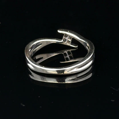 9ct white gold diamond ring in size O with a sparkling diamond, showcasing elegant jewelry craftsmanship.