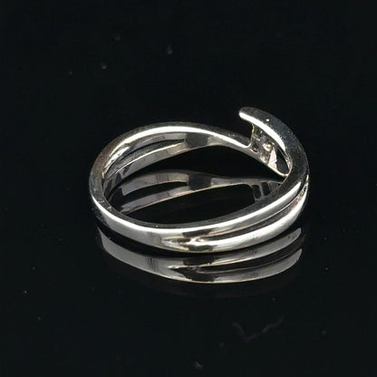 9ct white gold diamond ring in size O with a sparkling central diamond, elegant jewelry piece without branding.