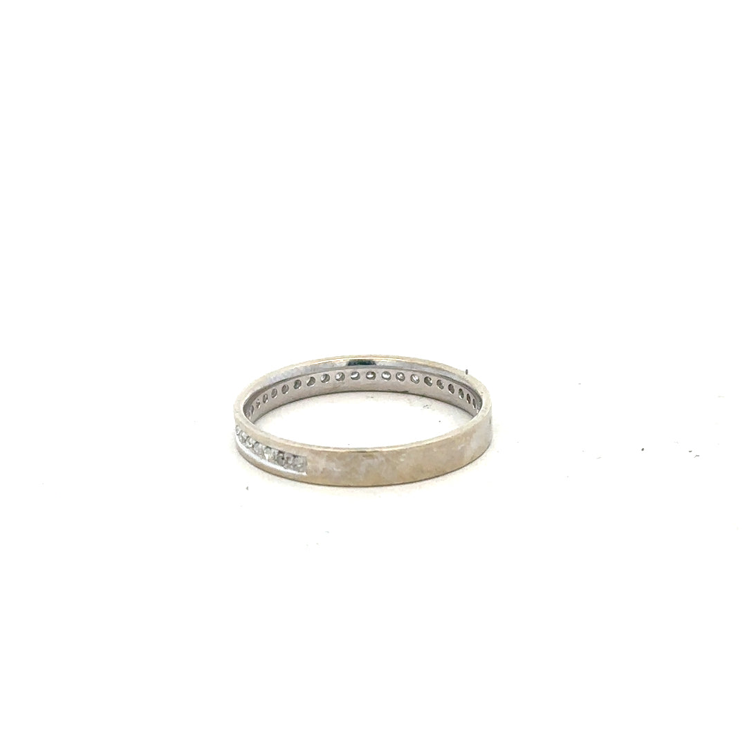 9ct white gold diamond ring size O1/2 with sparkling diamonds, showcasing elegant craftsmanship and a sleek band design.