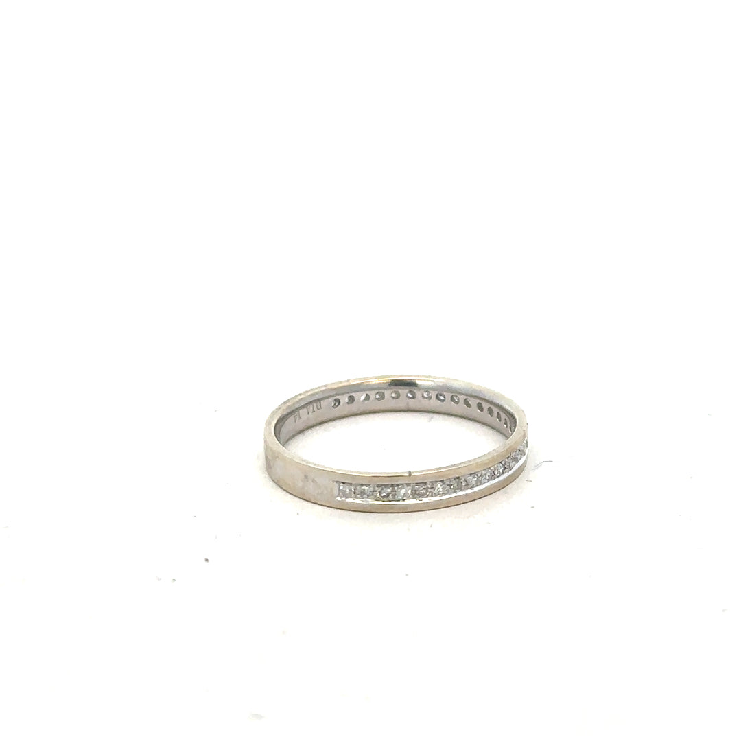 9ct white gold diamond ring size O1/2 featuring a sparkling diamond set in a sleek band.