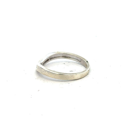 9ct white gold diamond ring in size P with a sparkling central diamond, unbranded jewelry piece.