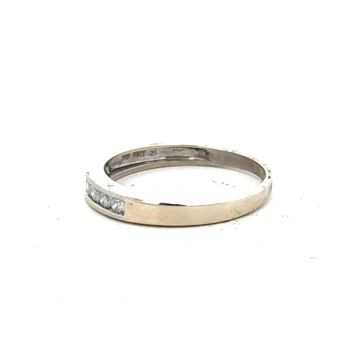 9ct white gold diamond ring in size Q with sparkling diamonds, showcasing elegant craftsmanship and a sleek, polished finish.
