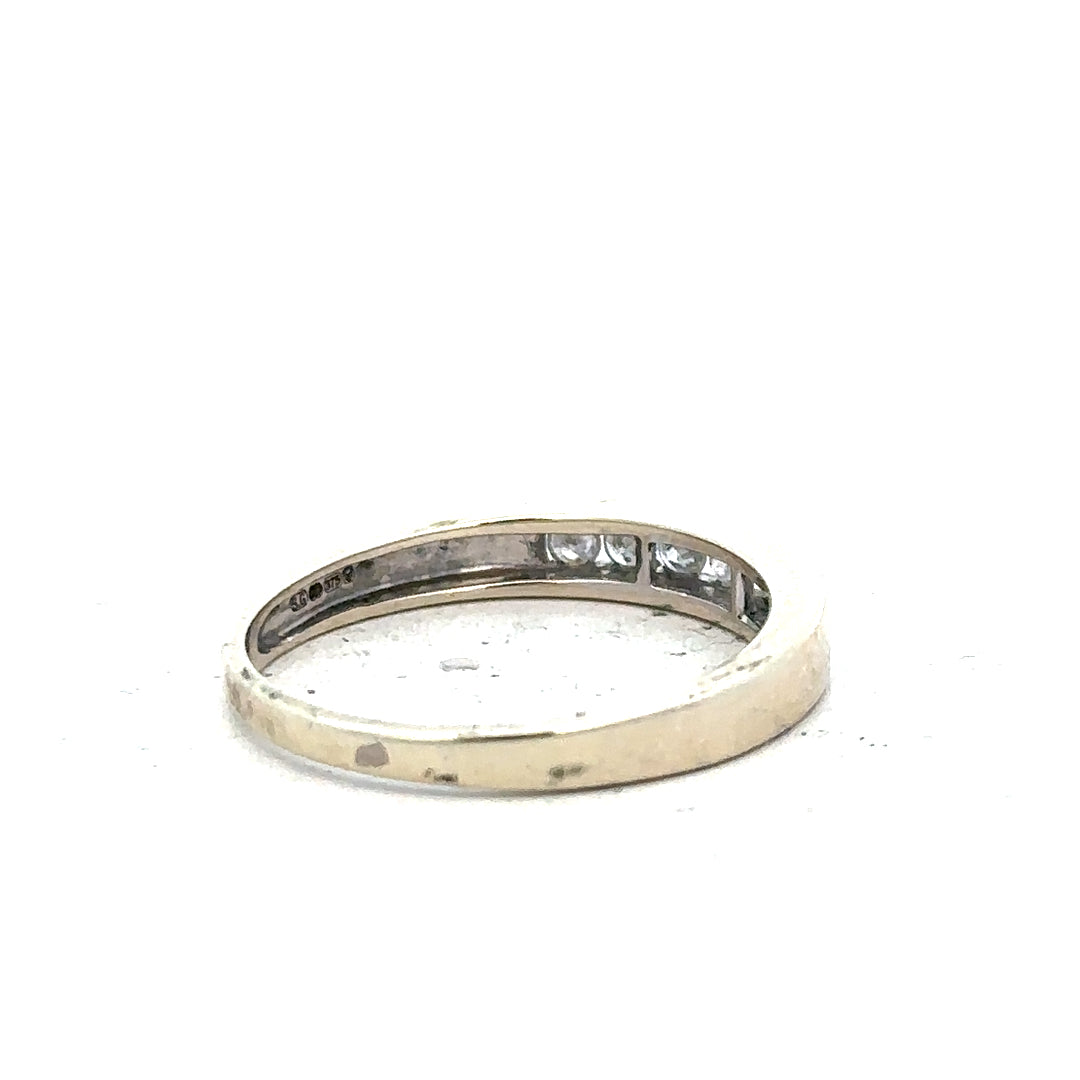 9ct white gold diamond ring in size Q with sparkling diamonds, featuring a classic band design.