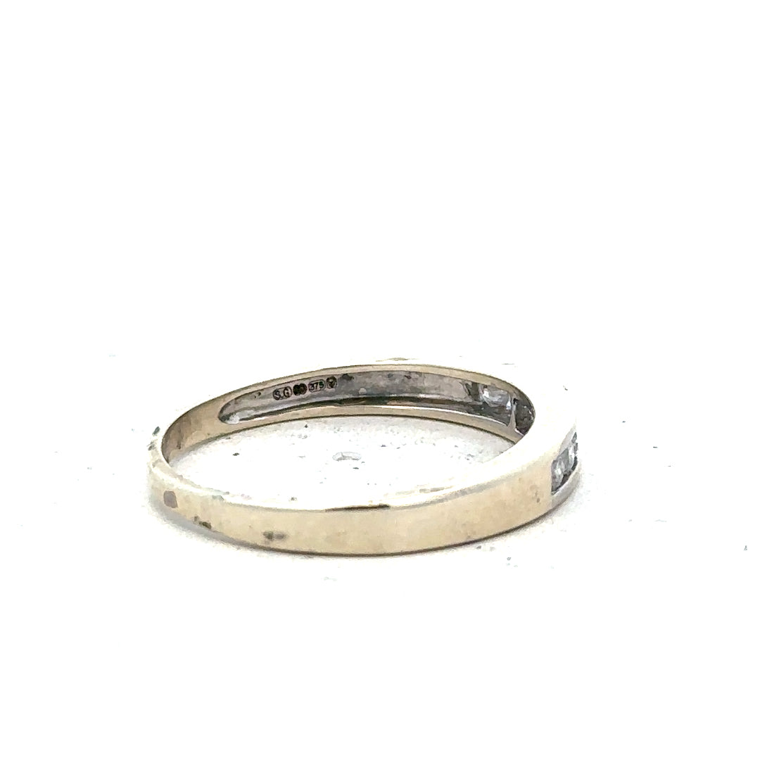 9ct white gold diamond ring in size Q with sparkling diamonds, unbranded jewelry piece showcasing elegant design and craftsmanship.