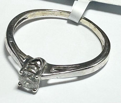 9ct white gold diamond ring in size Q1/2, featuring a sparkling diamond centerpiece and a sleek, elegant band.