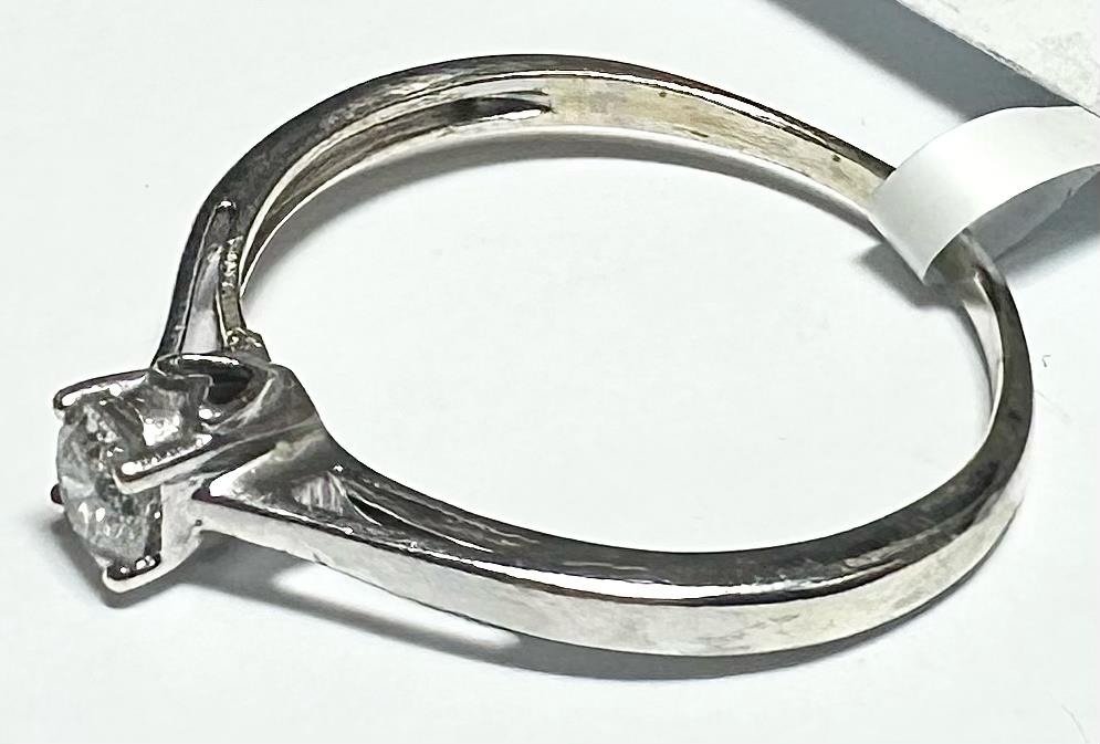 9ct white gold diamond ring in size Q1/2 with sparkling diamonds and a sleek band, unbranded jewelry accessory.