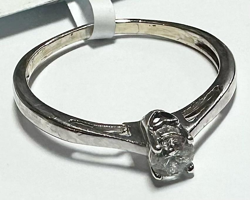9ct white gold diamond ring in size Q1/2 featuring a sparkling central diamond and elegant band design.