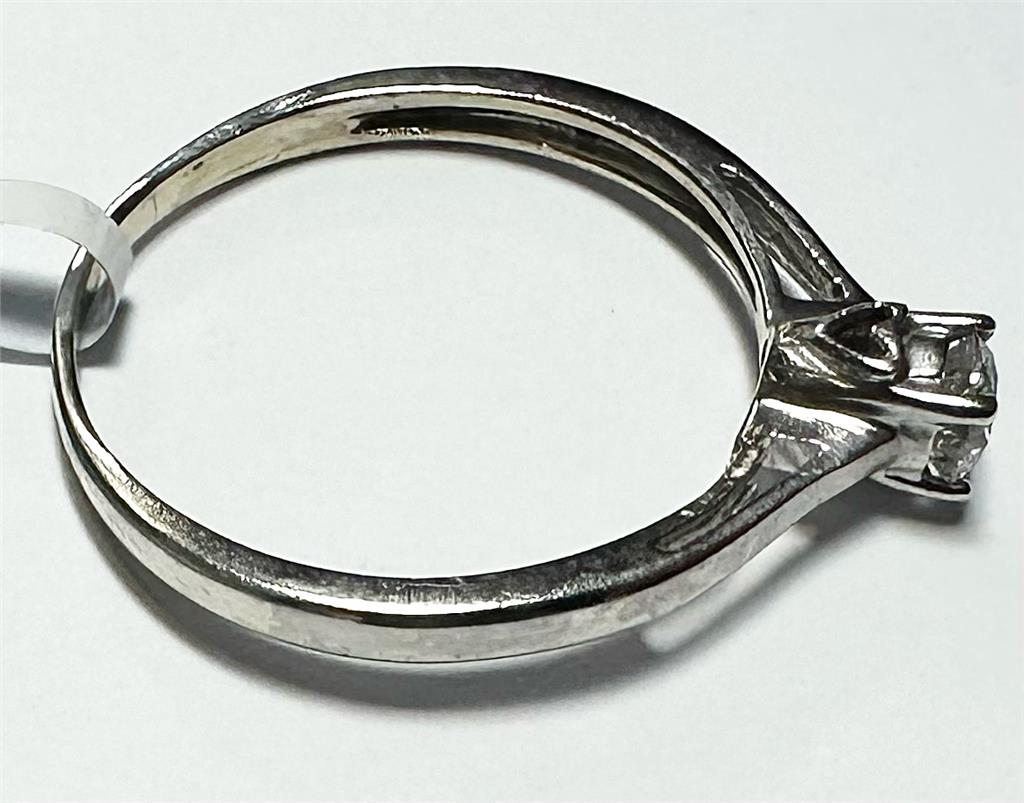9ct white gold diamond ring size Q1/2 with sparkling diamonds, showcasing a elegant, unbranded jewelry design.
