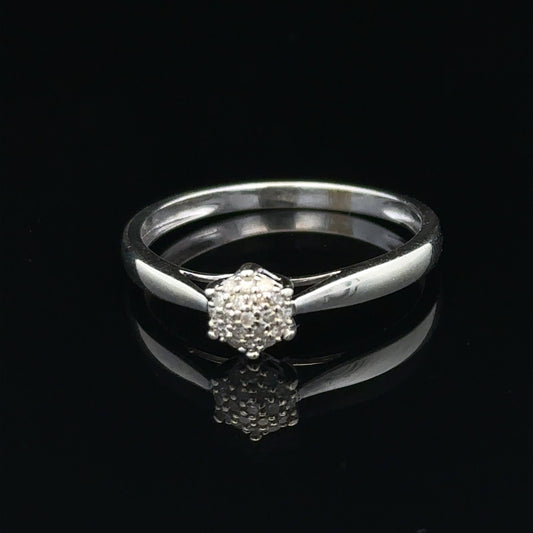 9ct white gold diamond ring in size R1/2 featuring a sparkling diamond accent, elegant jewelry piece.