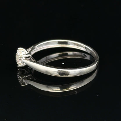 9ct white gold diamond ring in size R1/2, featuring a sparkling diamond set in an elegant unbranded jewelry design.