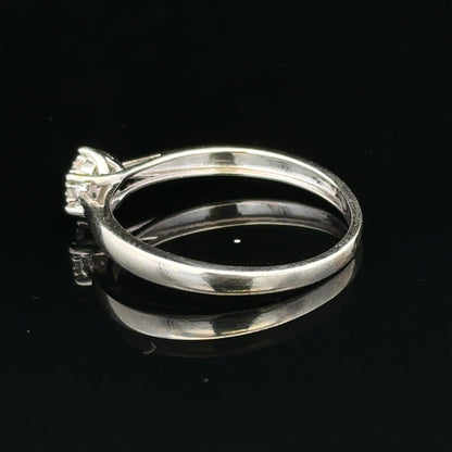 9ct white gold diamond ring in size R1/2, featuring a sparkling diamond setting and a sleek, polished band.