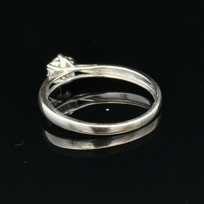 9ct white gold diamond ring in size R1/2, featuring a sparkling diamond set in a sleek, elegant band.