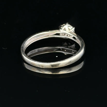 9ct white gold diamond ring in size R1/2, showcasing a sparkling diamond setting on a sleek band.