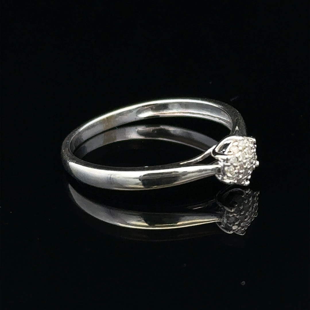 9ct white gold diamond ring in size R1/2 featuring a sparkling diamond setting, unbranded jewelry accessory.