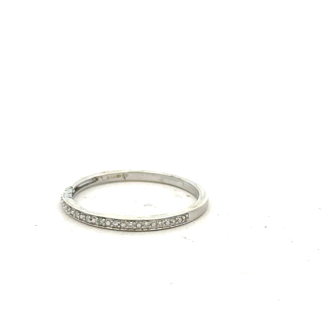 9ct white gold diamond ring in size S, unbranded, with a sparkling diamond centerpiece, displayed on a neutral background.