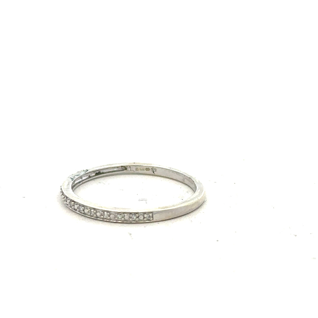 9ct white gold diamond ring in size S with sparkling diamonds, showcasing elegant jewelry design.